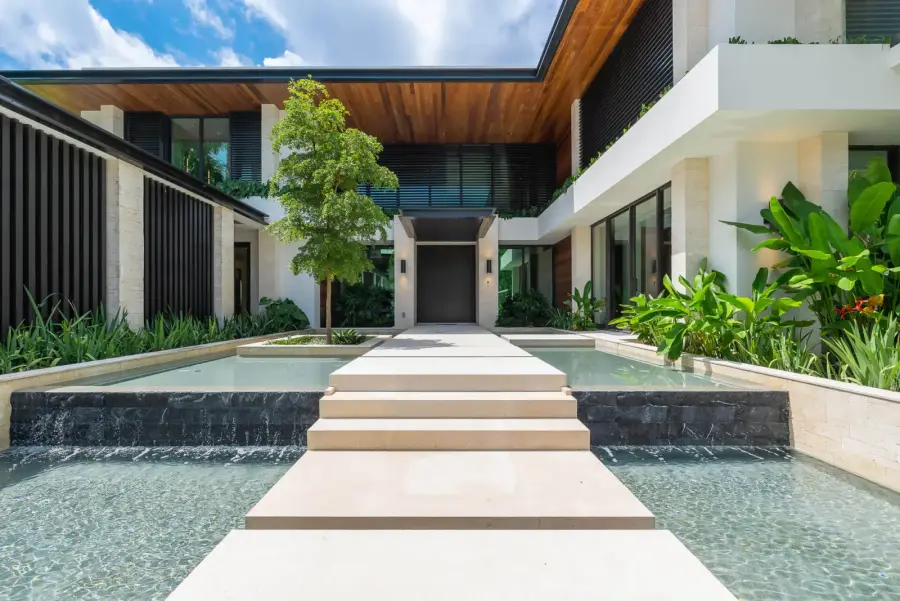 Entry court water feature with travertine steps
